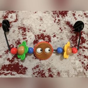 Baby Bjorn wooden toy bar with googly eyes